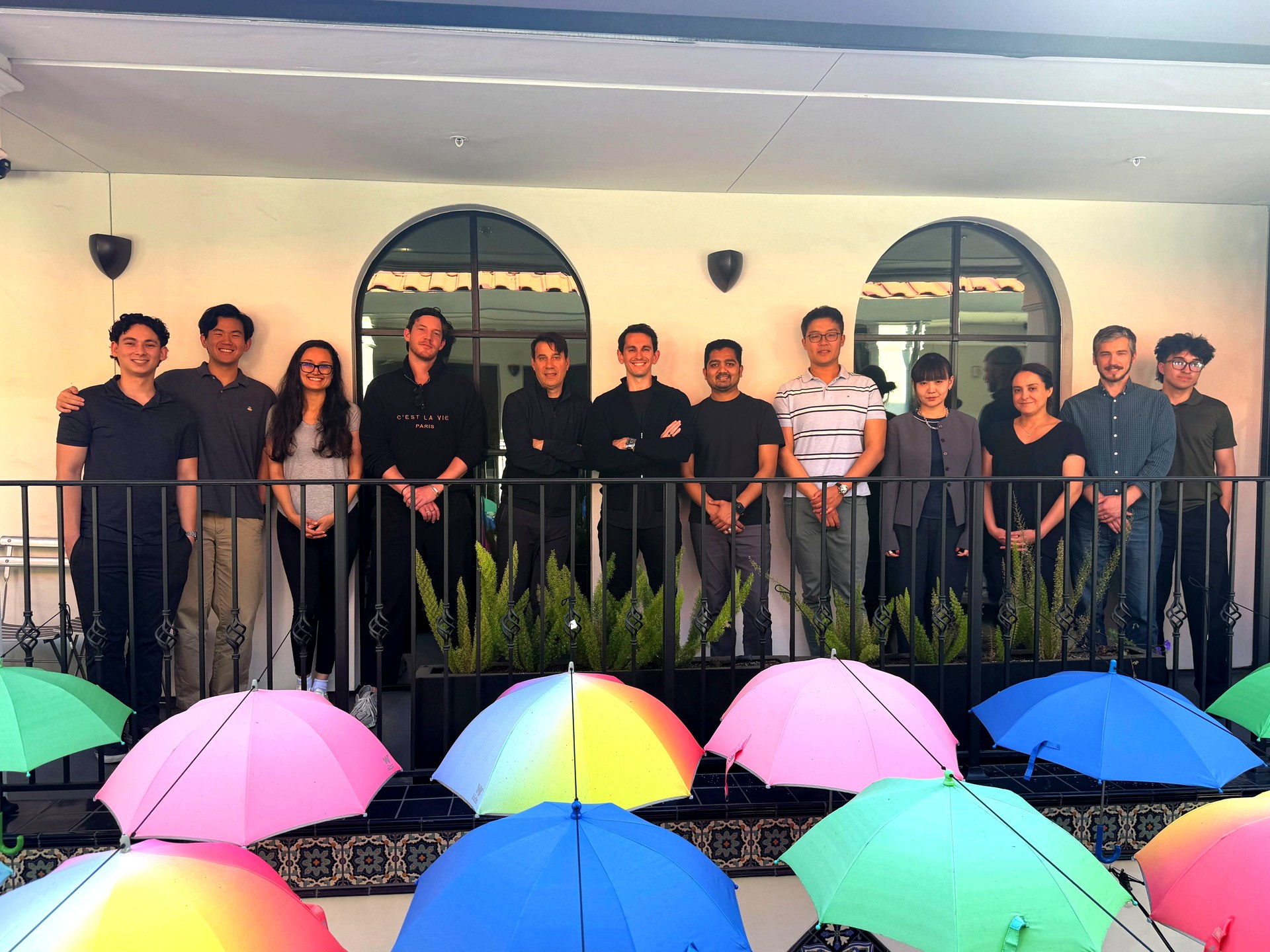 Rob with the Uare.ai team on the balcony
